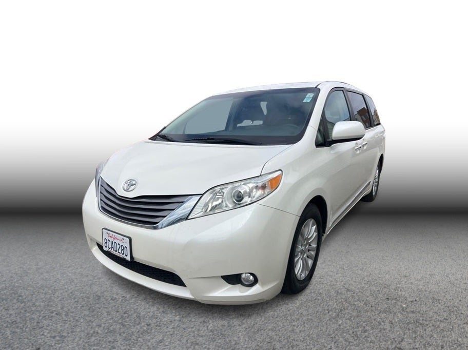 2017 Toyota Sienna XLE Premium Minivan 4D in White — front three-quarter view