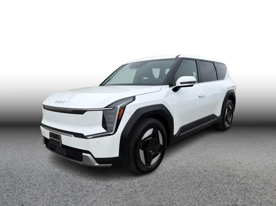 2024 Kia EV9 Light Long Range Sport Utility 4D in White — front three-quarter view