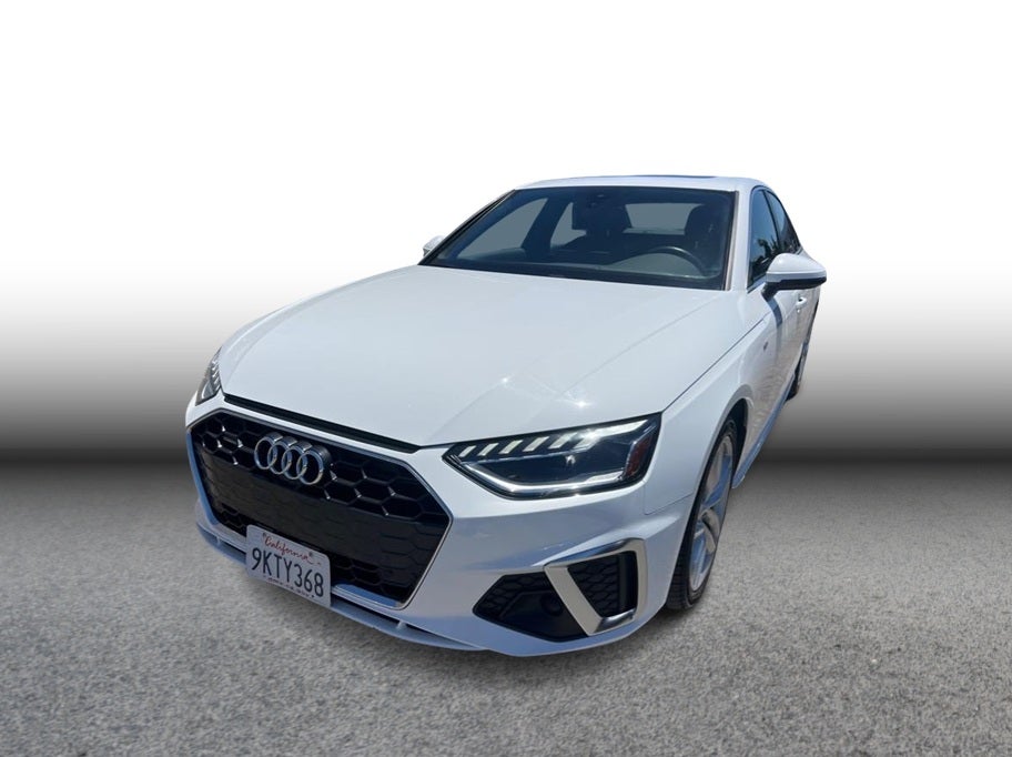 2024 Audi A4 S line 45 TFSI Premium Plus Sedan 4D in White — front three-quarter view