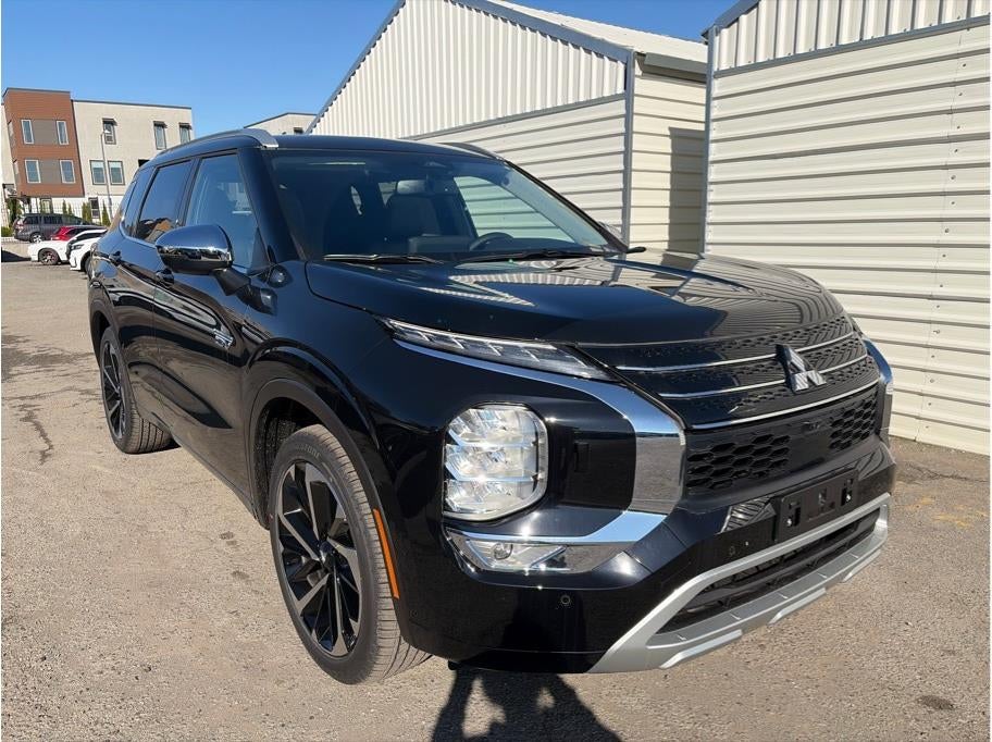 2025 Mitsubishi Outlander PHEV — rear three-quarter view