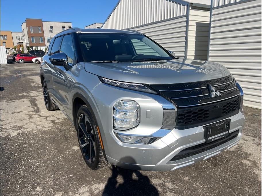 2025 Mitsubishi Outlander PHEV — rear three-quarter view