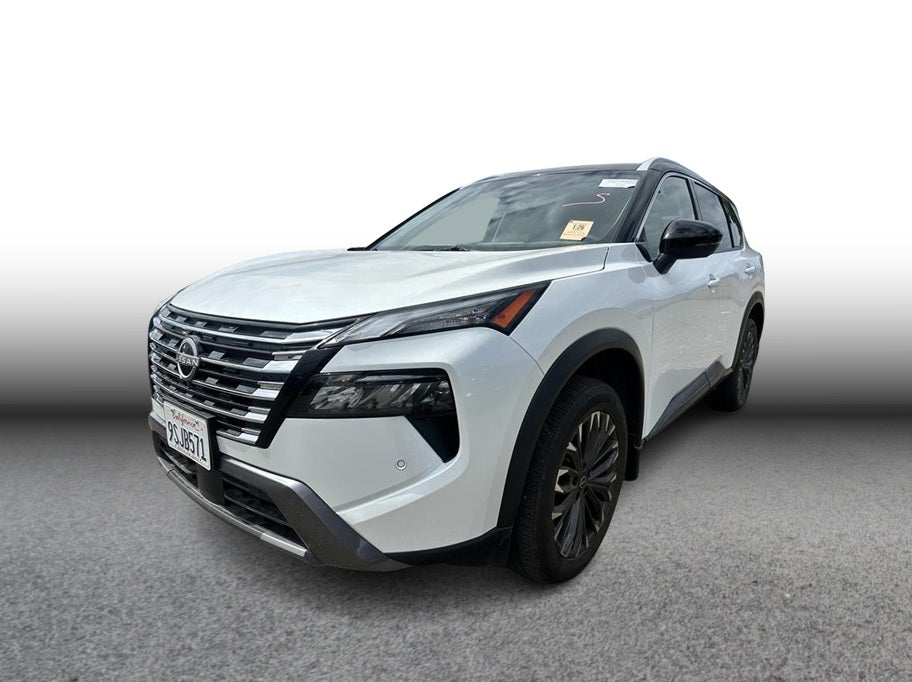 2025 Nissan Rogue SL Sport Utility 4D in White — front three-quarter view