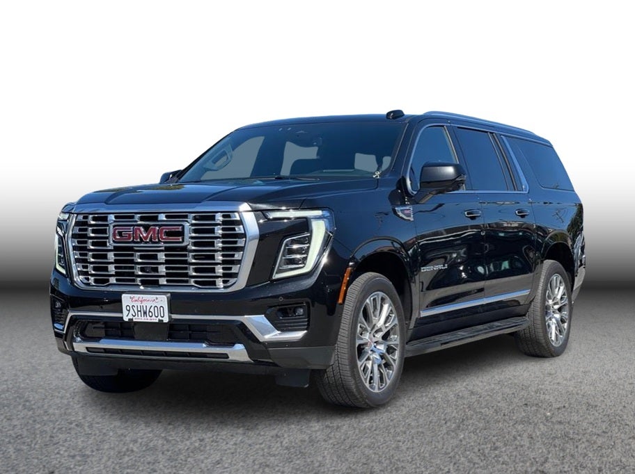 2025 GMC Yukon XL Denali Sport Utility 4D in Black — front three-quarter view