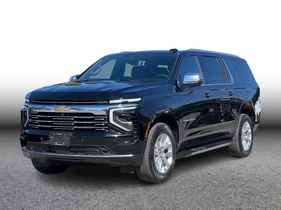 2025 Chevrolet Suburban Premier Sport Utility 4D in Black — front three-quarter view