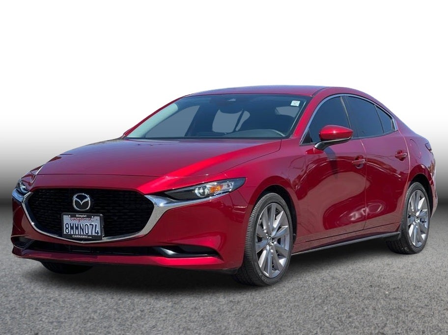 2019 Mazda MAZDA3 Preferred Sedan 4D in Red — front three-quarter view