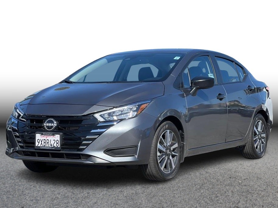 2025 Nissan Versa S Sedan 4D in Gray — front three-quarter view