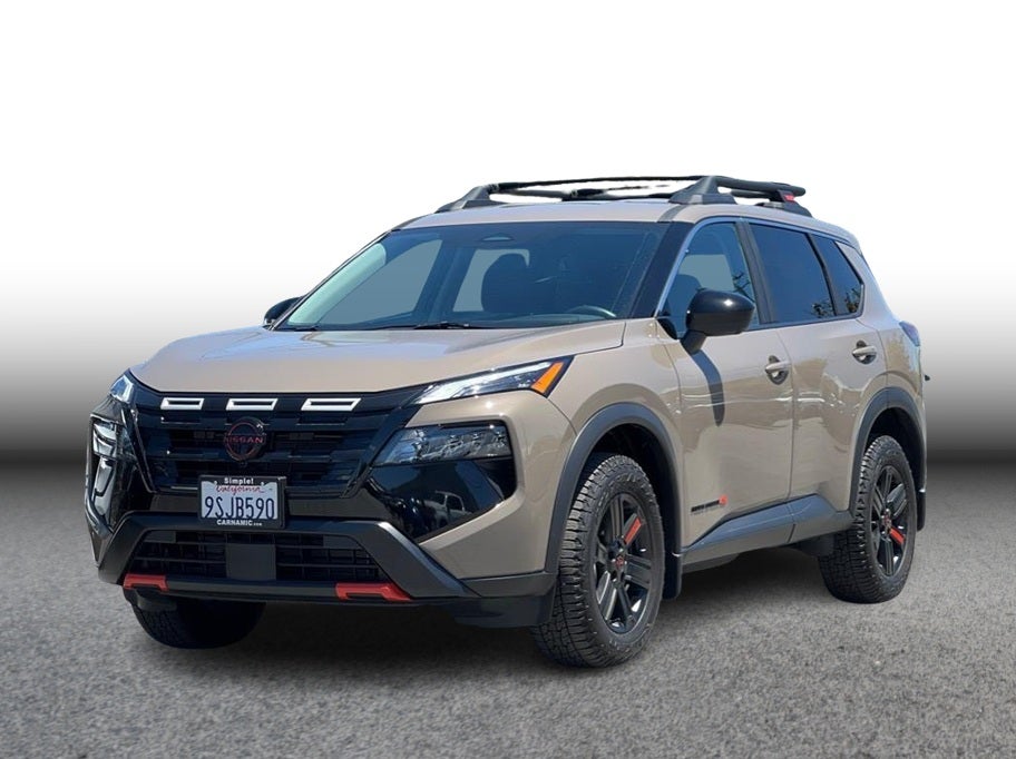 2025 Nissan Rogue Rock Creek Sport Utility 4D in Tan — front three-quarter view