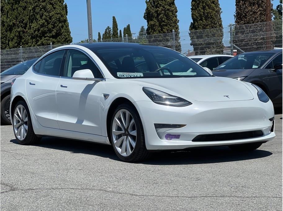 2019 Tesla Model 3 — rear three-quarter view