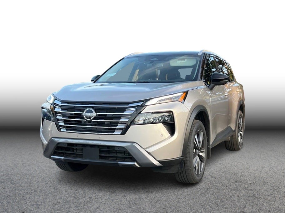 2025 Nissan Rogue SL Sport Utility 4D in Champagne — front three-quarter view